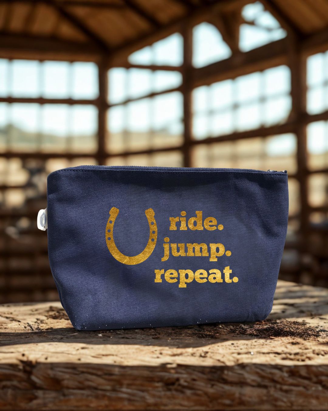 Navy canvas makeup bag with metallic gold foil horseshoe equestrian design