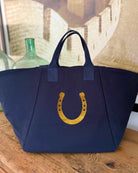 Navy Chelsea Bag with metallic gold foil horse head equestrian design