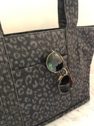 Midi Zipper Tote: Black Leopard Coated Canvas with Black Pom Poms - Quilted Koala